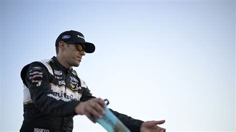 Almirola grabs lead on overtime restart and wins at Martinsville in .